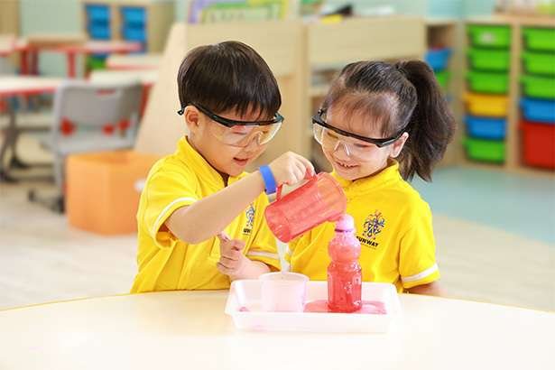 Kindergarten pupils in a hands-on class at SIS